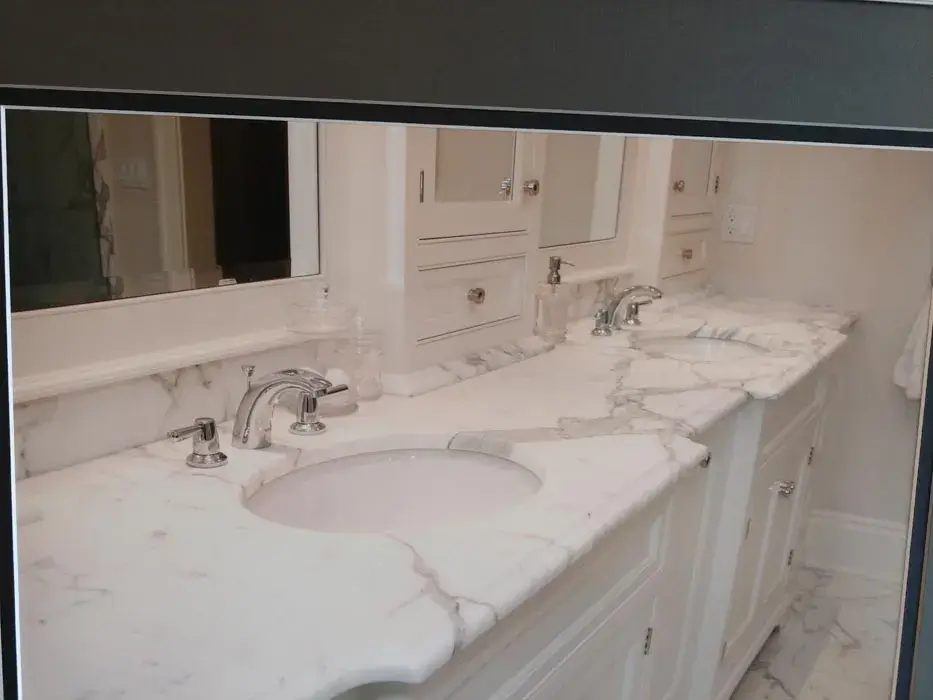 Double bathroom vanity with a marble countertop and two sinks