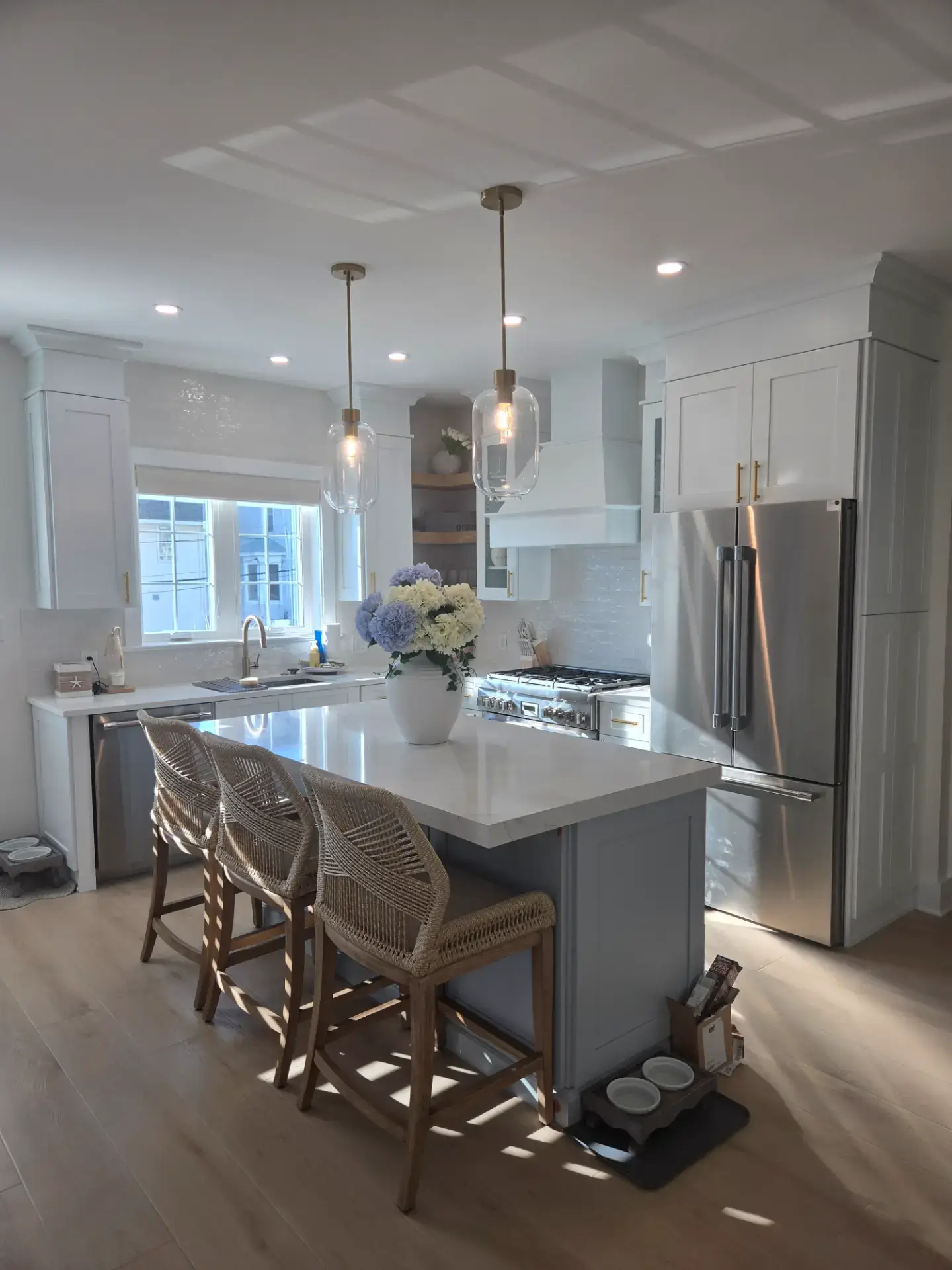 Kitchen island with pendant lighting and counter seating
