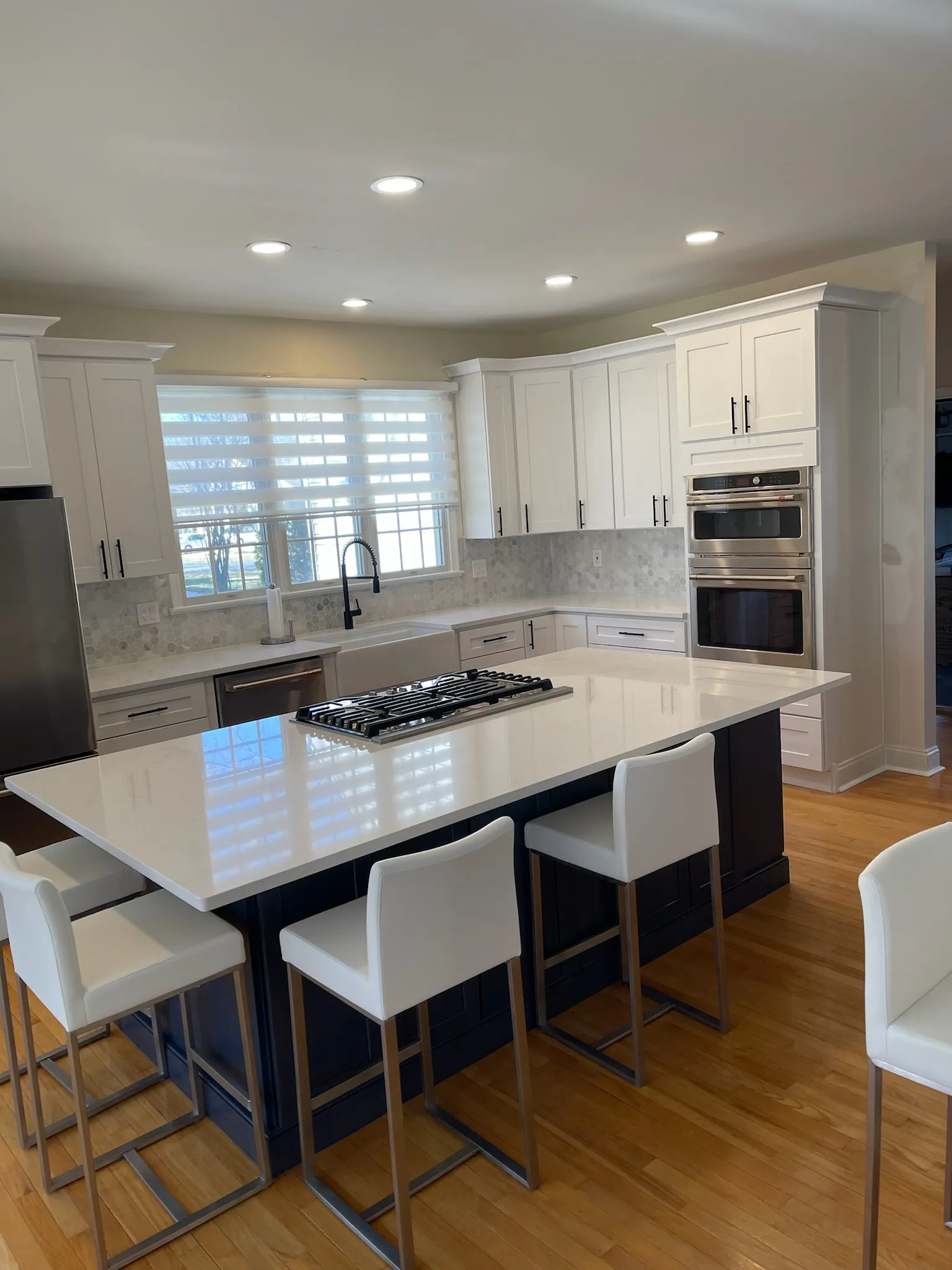 Tall cabinet wall of the same modern kitchen