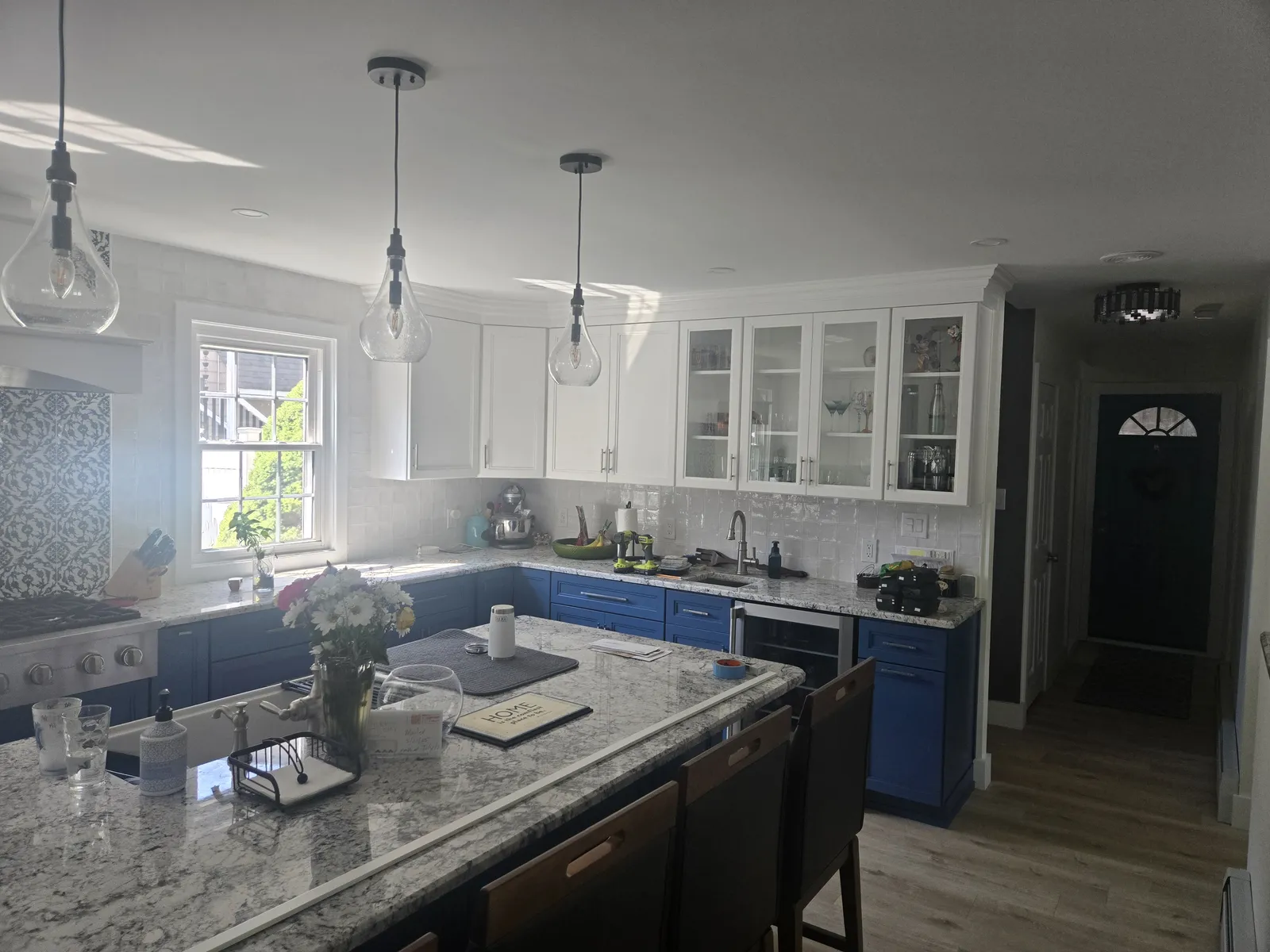 Range wall of the same navy kitchen